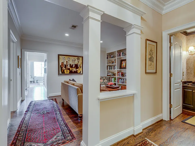 Foyer in to library/den and guest half bath