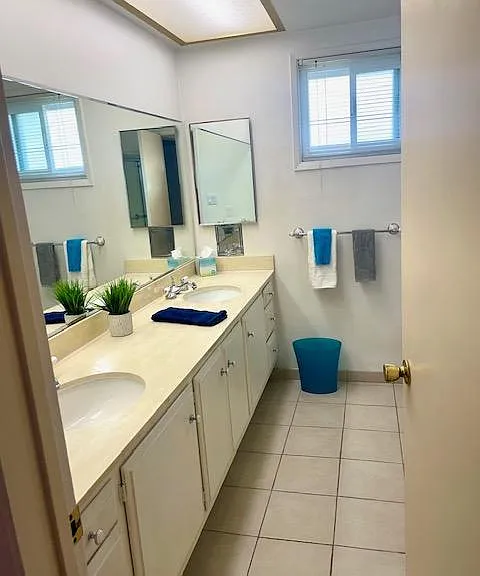 Main bathroom, upstairs with tub & shower.