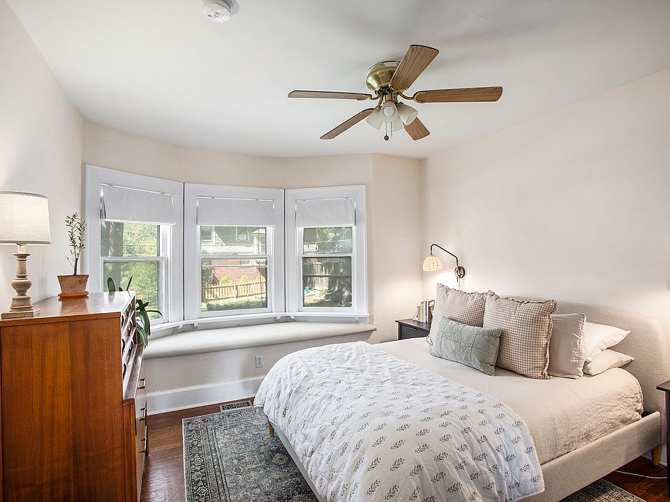 Master bedroom with windows over looking back yard