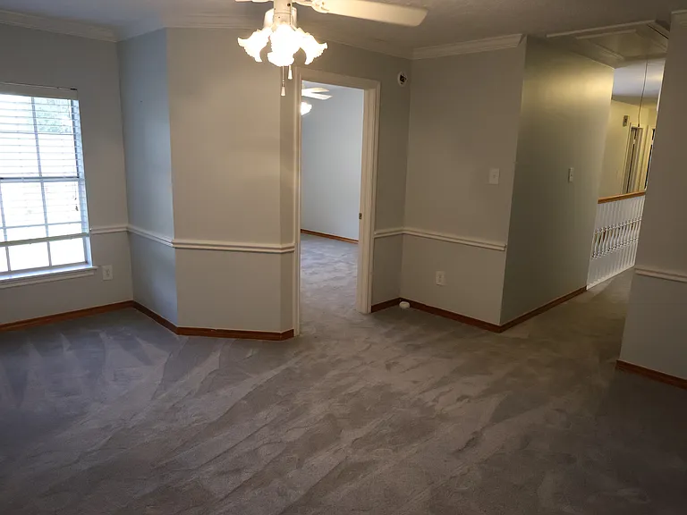 Standing in the study, looking into bedroom #4. There is also a great view of the street from this room.