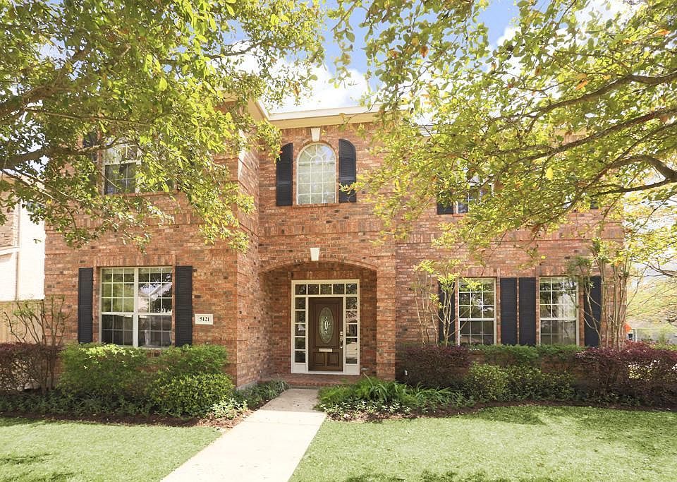 Welcome to 5121 Palmetto! This beautiful brick traditional is located on a 9,000 sf lot and has been