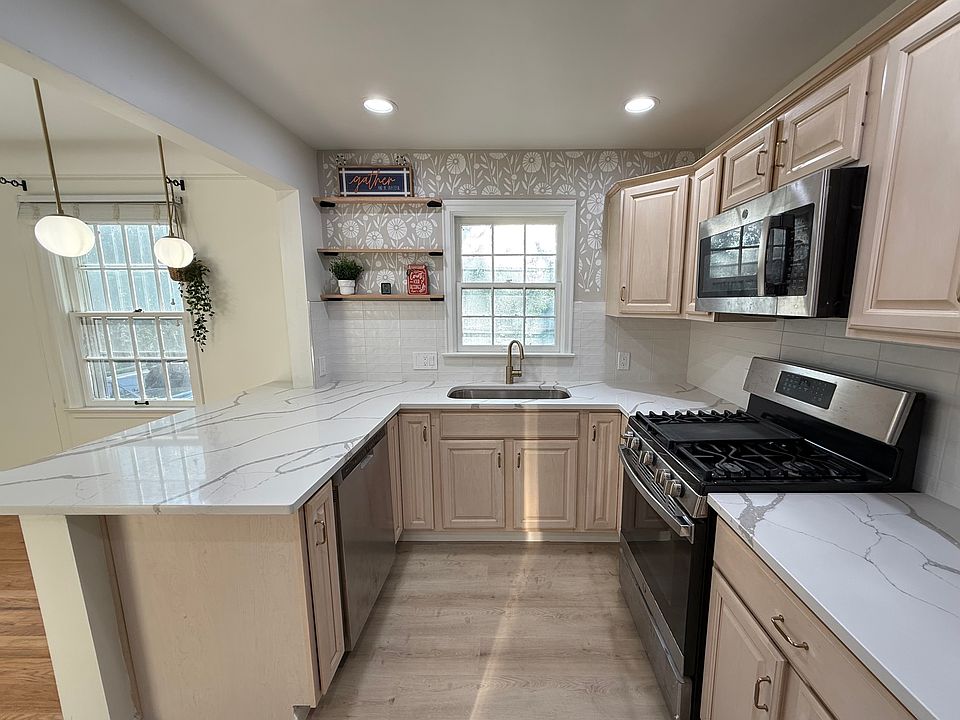 Newly renovated kitchen with quartz countertop