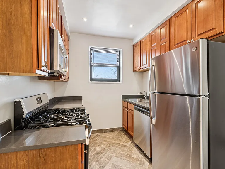 Kitchen
-stainless steel appliances including dishwasher, microwave oven, gas stove, fridge/freezer