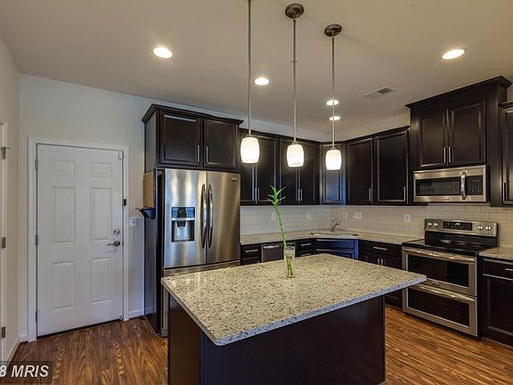 Granite countertops and stainless steel appliances