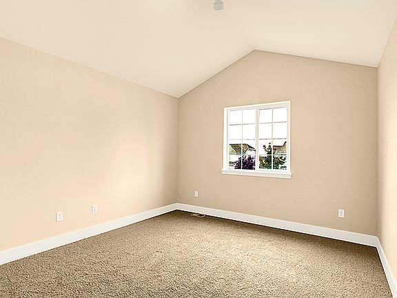 Bedroom includes track light