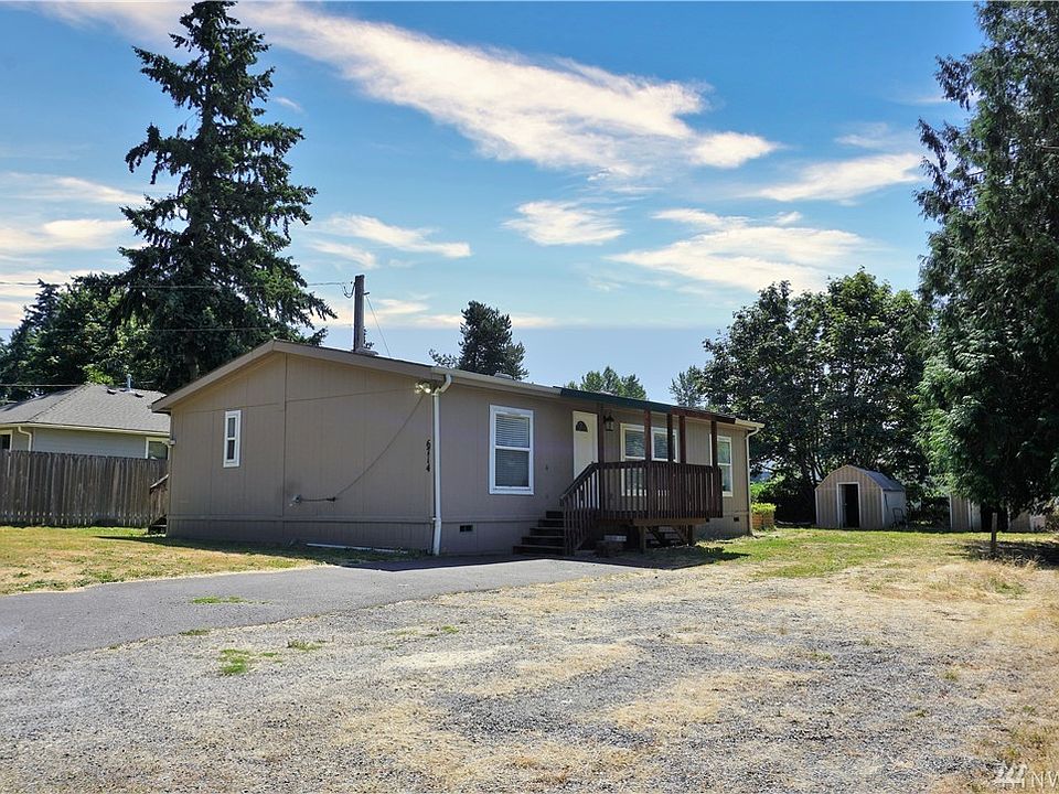 1/4 acre lot w/ample parking, 2 storage sheds/shop area A/C, Heat Pump and much more...