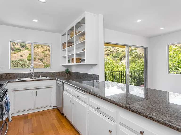 Bright and airy kitchen overlooks views from every angle.