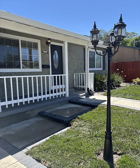 Additional view of Front of home and adorable lamp-post.