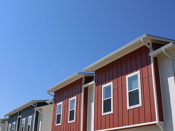 Modern townhome-style living with attached two-car garages.