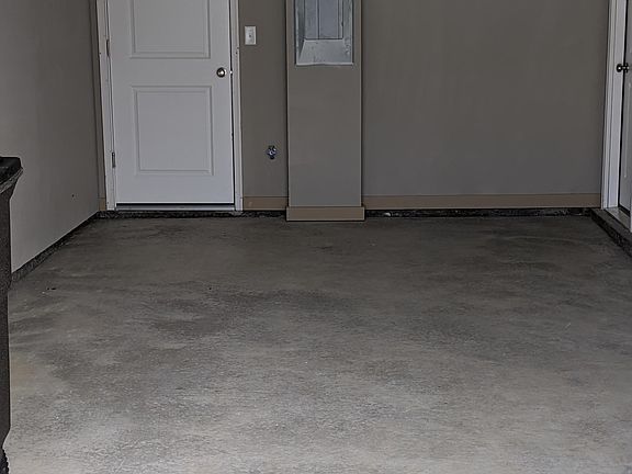 Single car garage and extra long driveway.