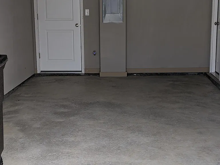 Single car garage and extra long driveway.