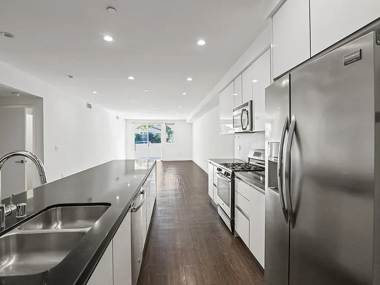 Open-Concept Kitchen, Dining, and Living Room Areas