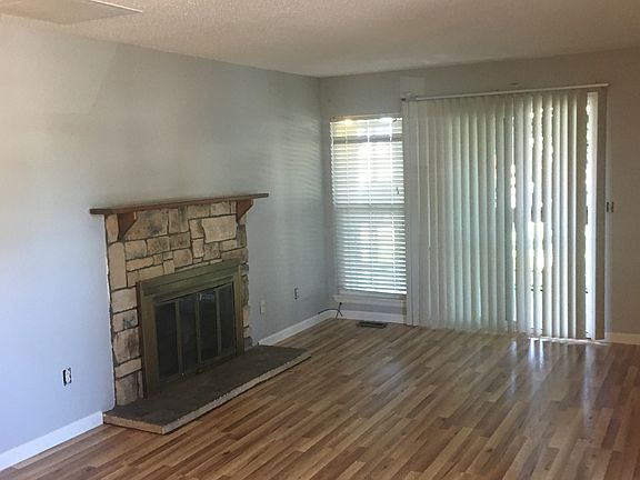 Living room with gas firepla