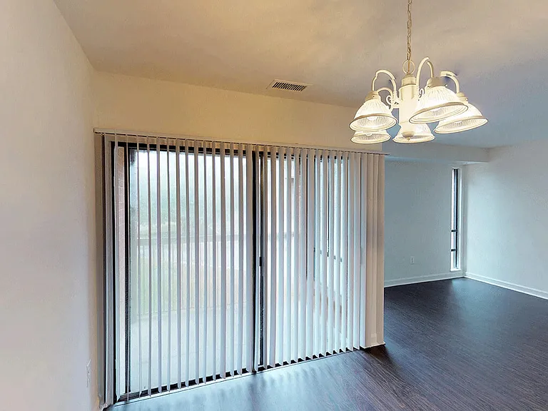 Bright overhead lighting and floor to ceiling windows