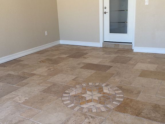 Travertine tile in garage