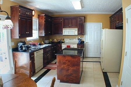 Granite counter tops and marble floor