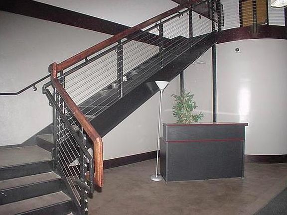 Stairs in the lobby to the apartment.