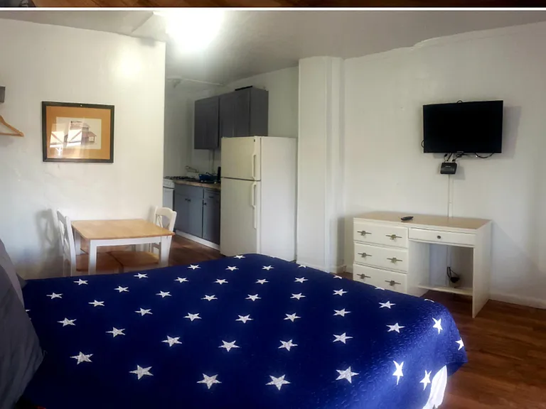 Semi furnished with a kitchenette including a full sized fridge and microwave