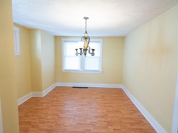 Formal Dining room, beautiful chandelier, wood floors, large