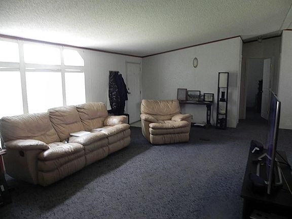 LARGE LIVING ROOM OPEN CONCEPT TO DINING ROOM