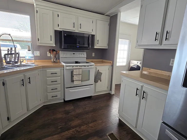 Kitchen
"Functional and welcoming kitchen with plenty of storage space."
