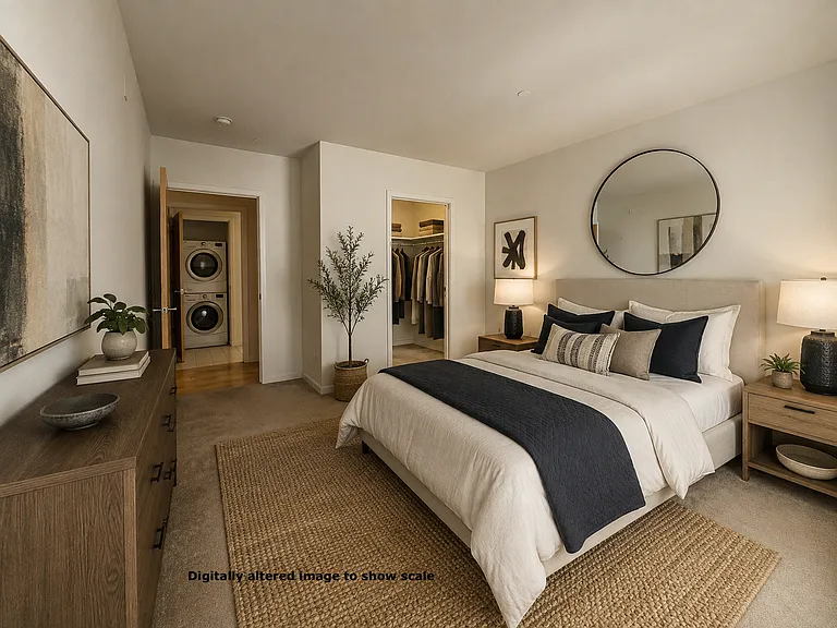 Bedroom with walk-in closet. Private deck off the bedroom. Nook for desk. Digitally altered photo to show scale. Queen bed pictured.