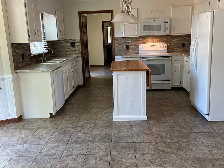 Eat in kitchen. Kitchen table sits to left of photo.