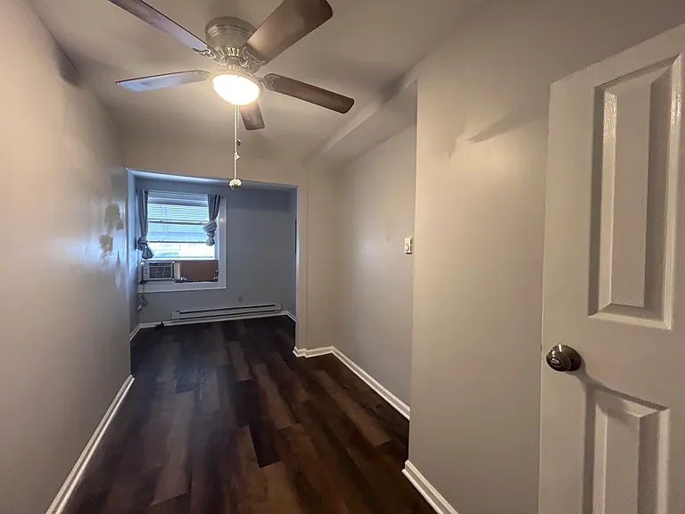 Bedroom #2 with new flooring and paint