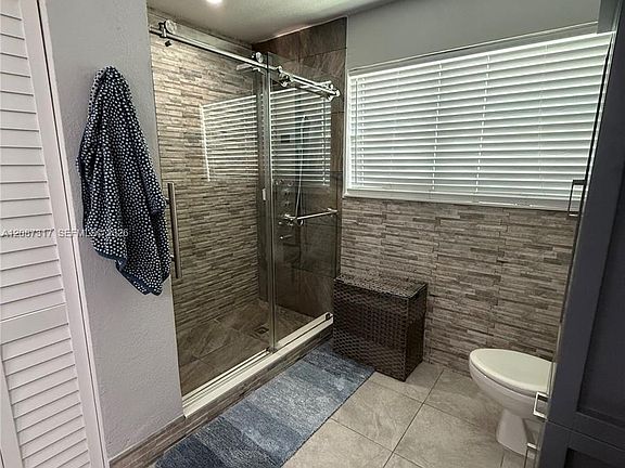 3rd image of 6821 W 2nd Ct