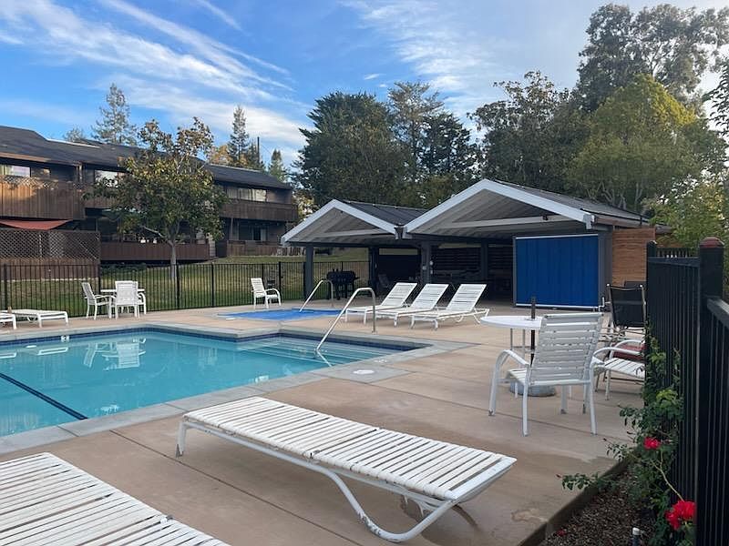 New community pool, spa, solar panels and cabana with working kitchen.