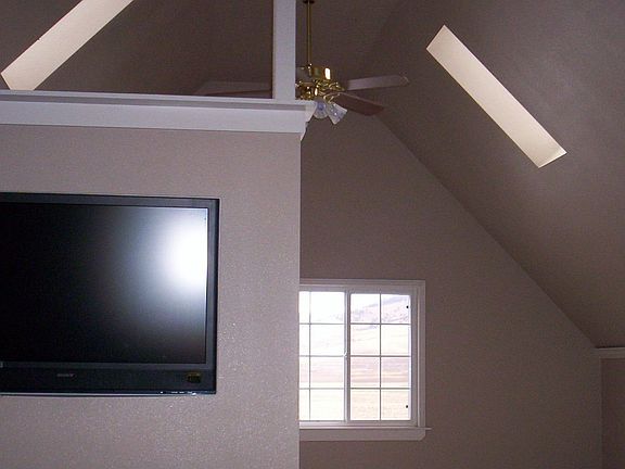 Vaulted Ceilings in Family Room with Skylights
