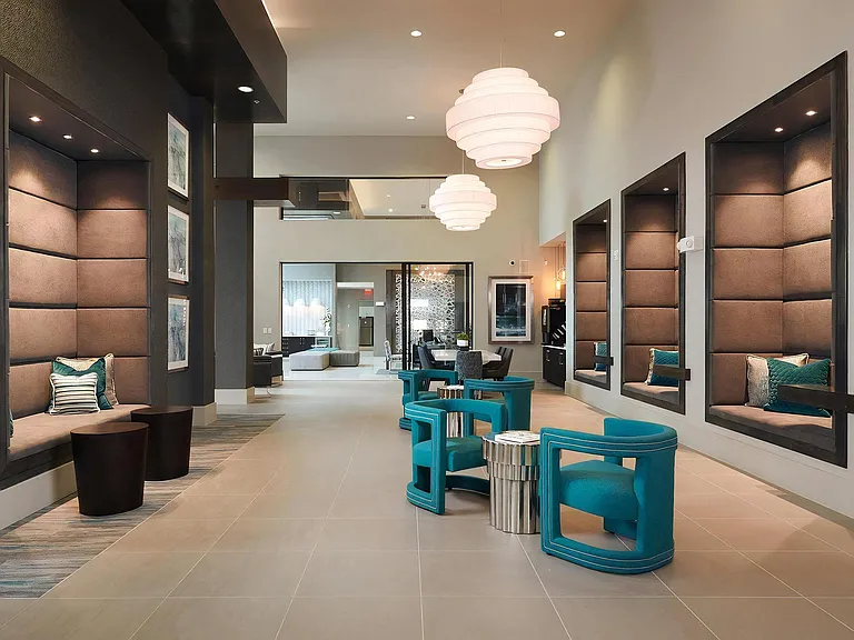 Clubhouse Lounge Featuring Cozy Alcoves, Plush Seating, and Designer Lighting