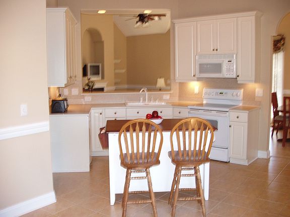 BREAKFAST AREA PLUS  ROOM FOR A TABLE IN KITCHEN