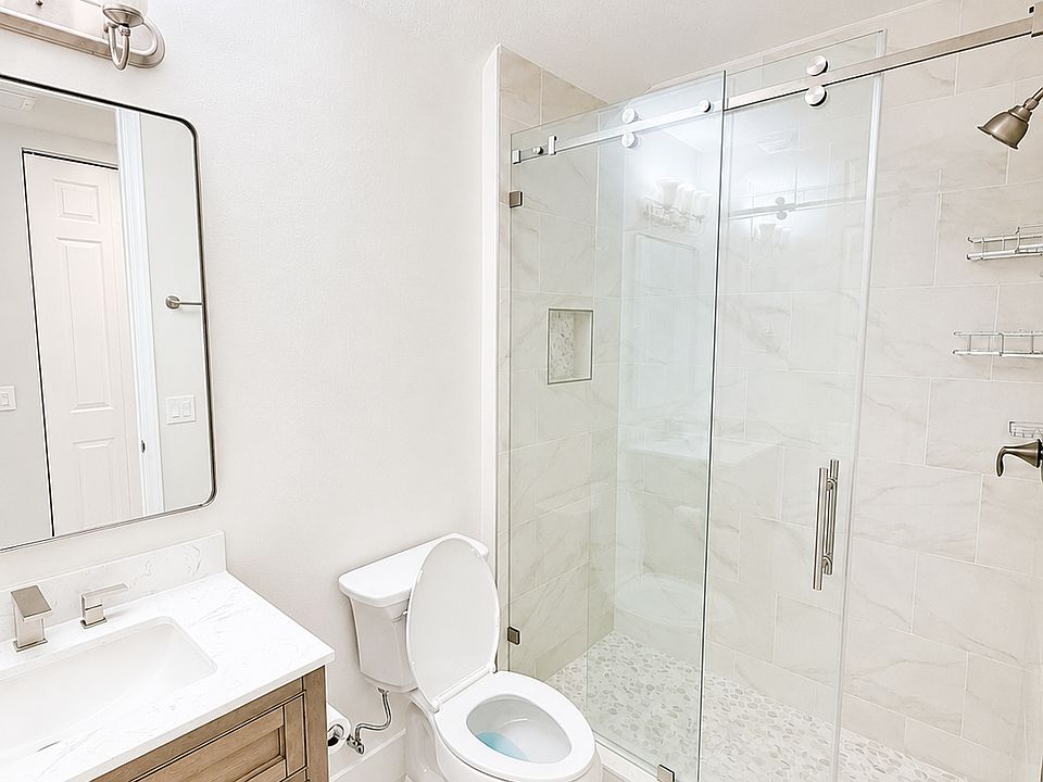 Guest bathroom with walking shower
