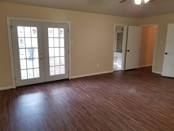 Master Bedroom with view to master bathroom
