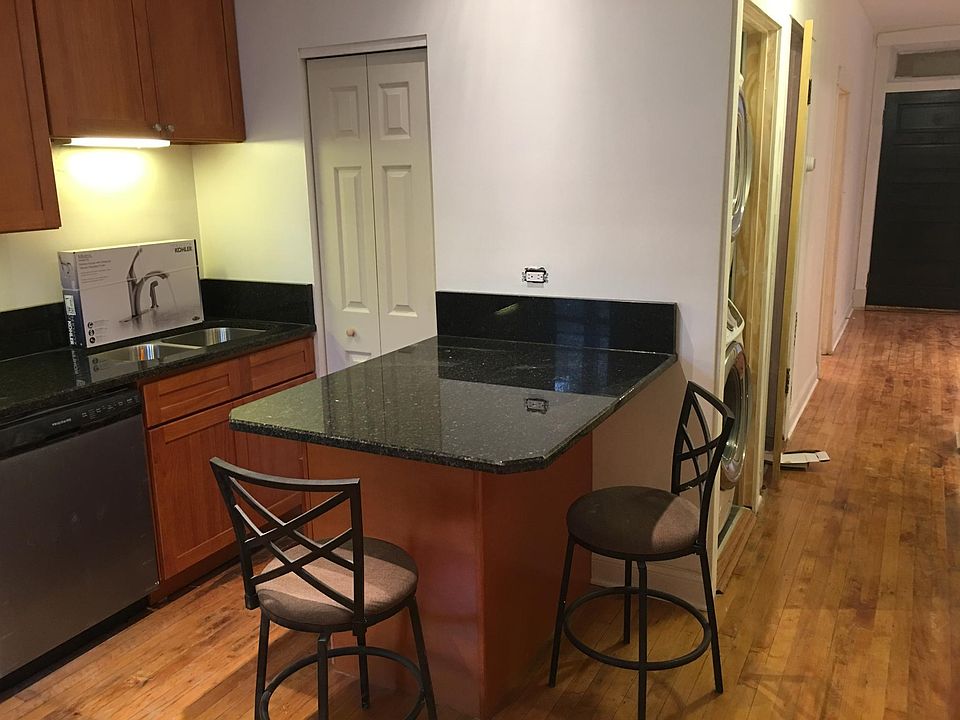New cabinets and granite island seating