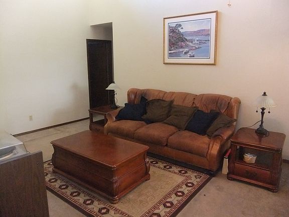 Living room with vaulted ceiling!