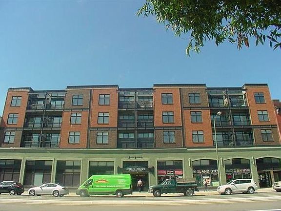 Street view of the whole building. The apartment balcony is the one in the center left.