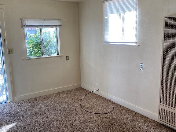 bright living room with new carpet