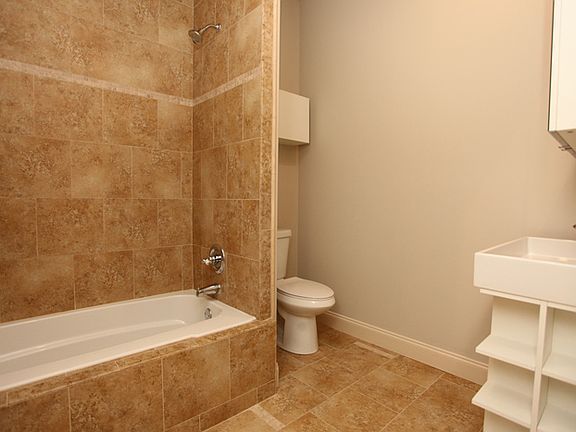 Spacious hall bath with high end finishes