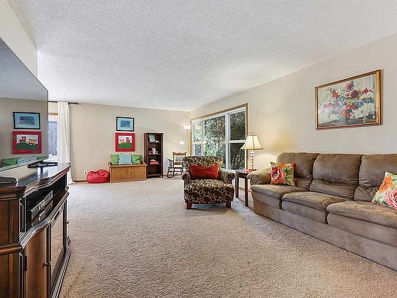 Massive living room opens to dining room