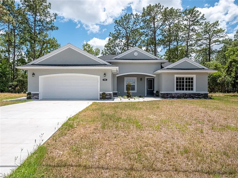 696 Marion Oaks Trl — Photo 1