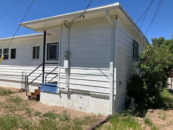 Back Yard, apple tree, quiet with canyon beyond the fence. No neighbors in the back.