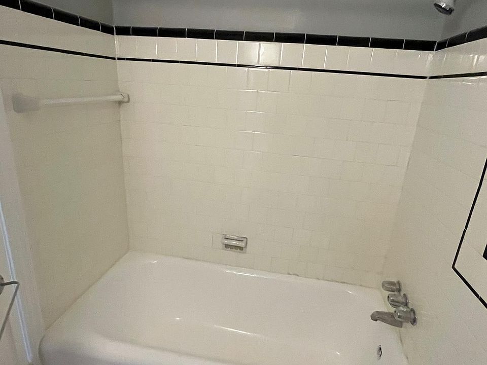 Tub with shower