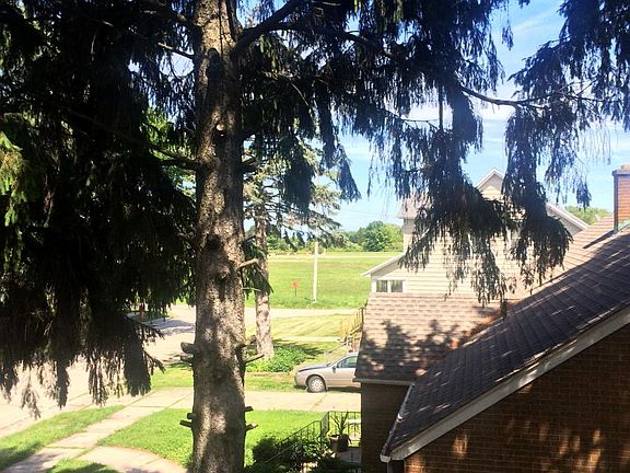 4th room upstairs is office/den