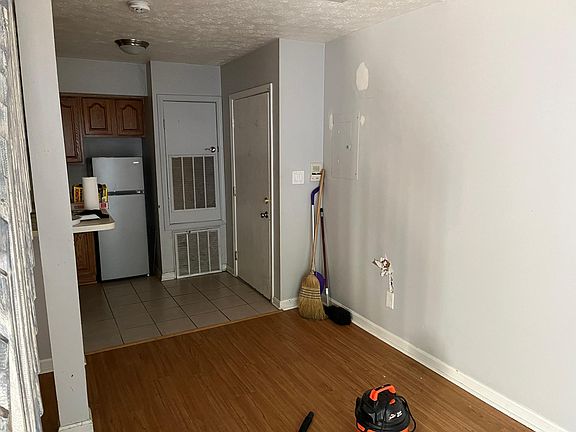 Downstairs kitchen area and front entrance