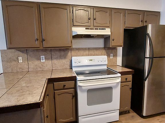 Kitchen with stove & refrigerator