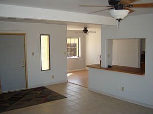 Entry, living, dining areas