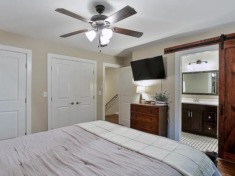 Ensuite with view of the bathroom and closets