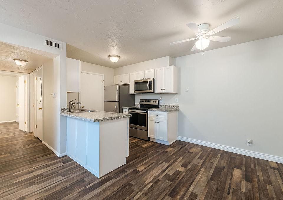 Brand new kitchen and flooring. Wood cabinets have self-closing hinges and drawers. Brand new appliances including dishwasher and washer/dryer.